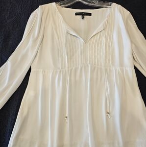 White House Black market cream colored baby doll shirt with lace bottom